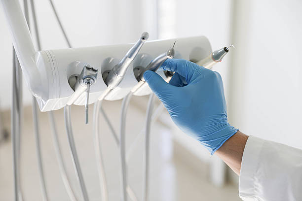 Professional Root Canal Treatment technician working in Brentwood, NY